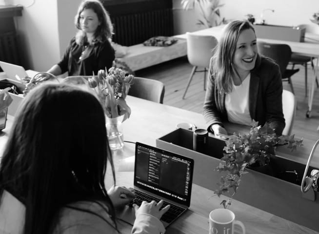 Female employes working and talking